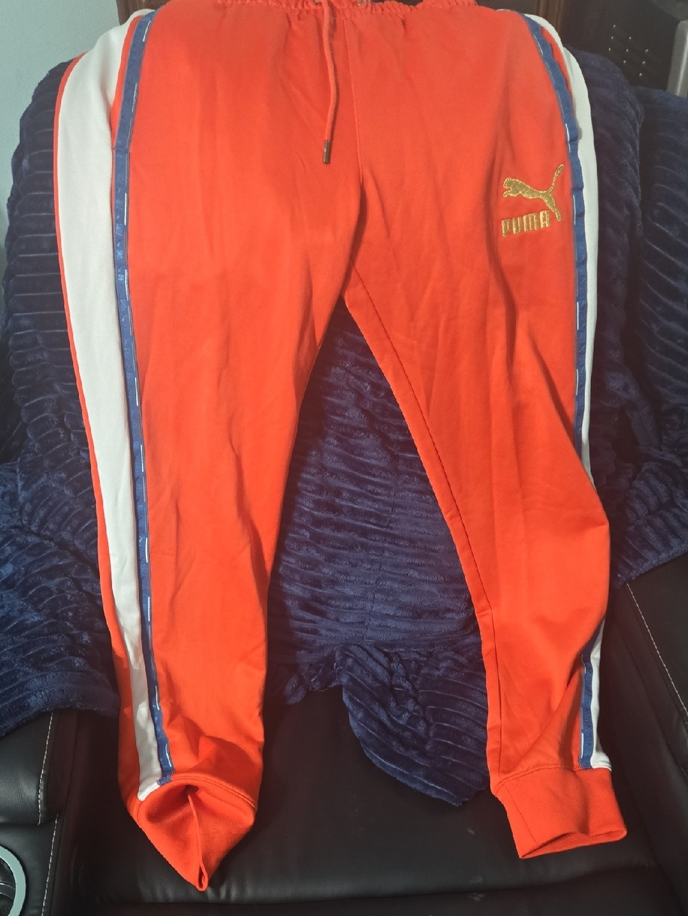 Puma Orange Joggers with White and Blue Side Stripes
